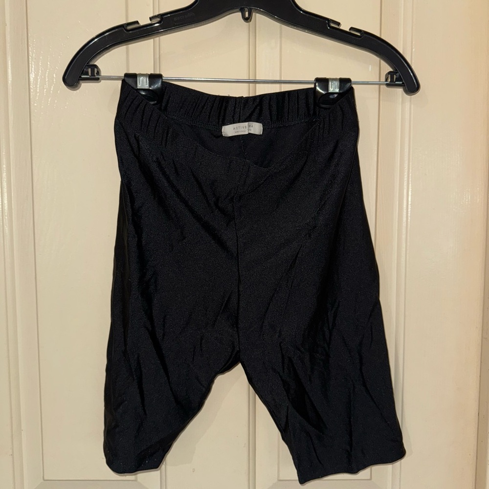 Black biker shorts with a shine to it